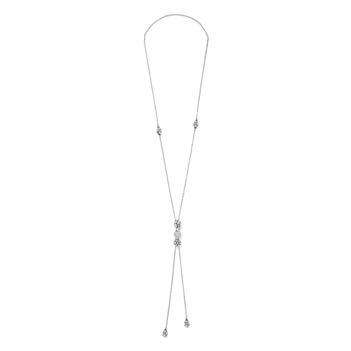 Brighton lariat necklace with silver-plated patterned beads and double drop chain ends on a white background