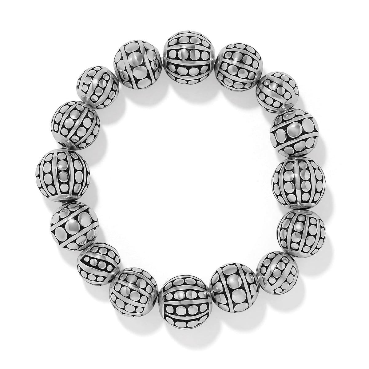 Brighton beaded stretch bracelet with silver-plated round beads featuring dotted and ribbed patterns on a white background