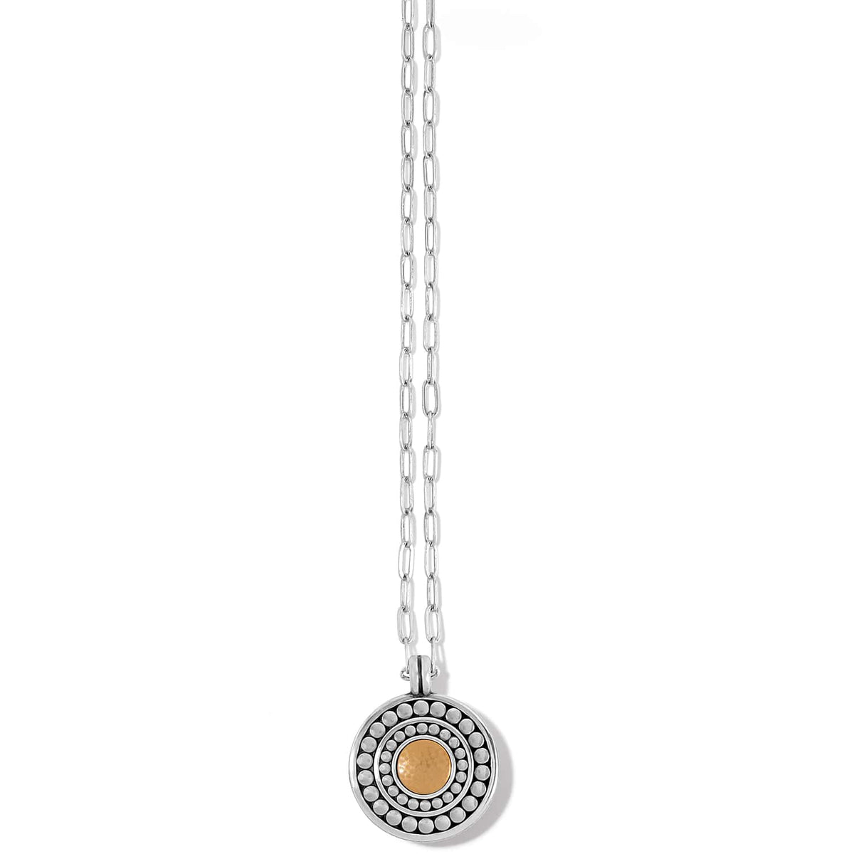 Brighton pendant necklace with silver-plated concentric dot circles surrounding a hammered gold-tone center on a white background