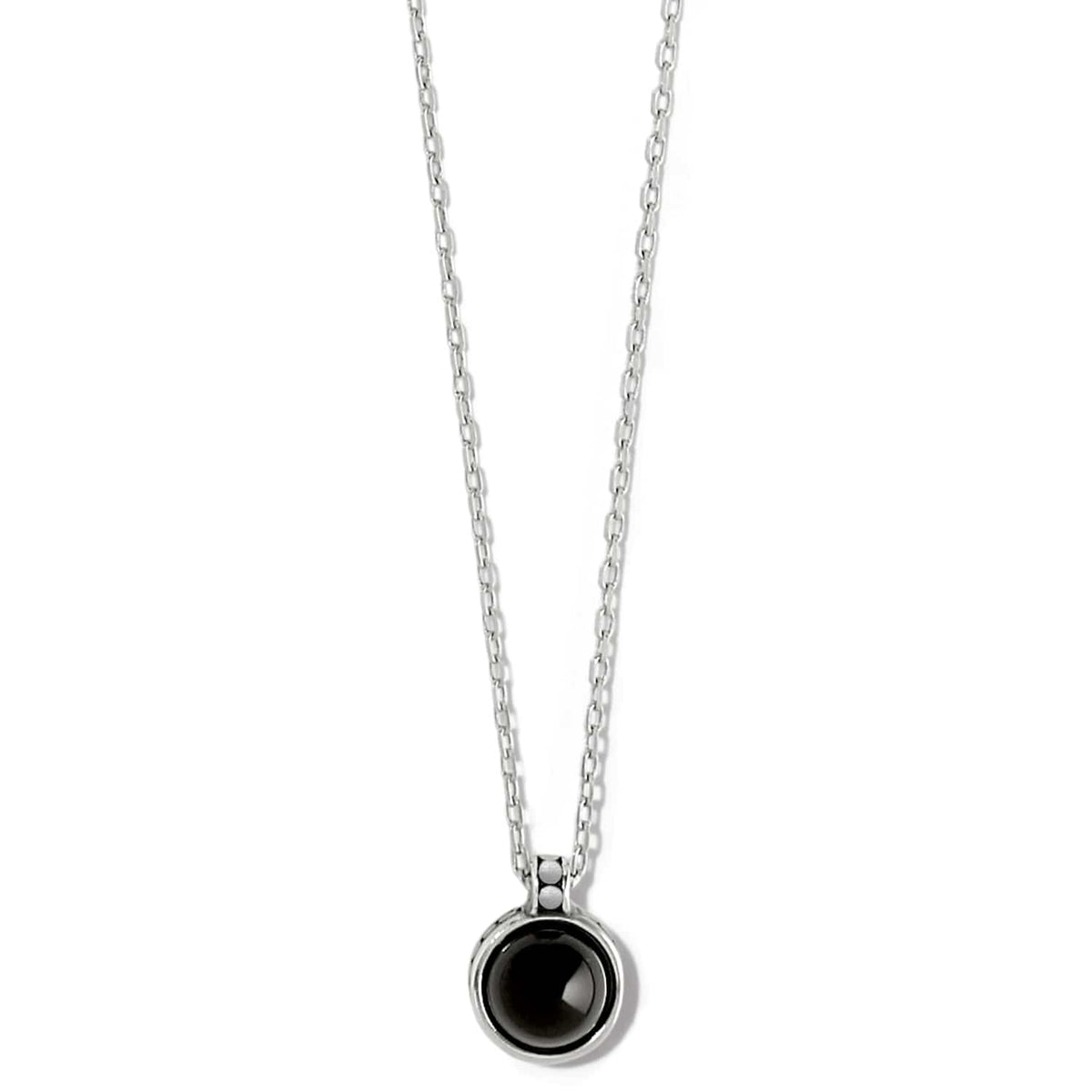 Brighton pendant necklace with round black stone, silver-plated bezel, and delicate cable chain on a white background