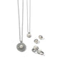 Brighton jewelry set styled with matching pearl pendant necklaces, stud earrings, and rings featuring silver-tone beaded details