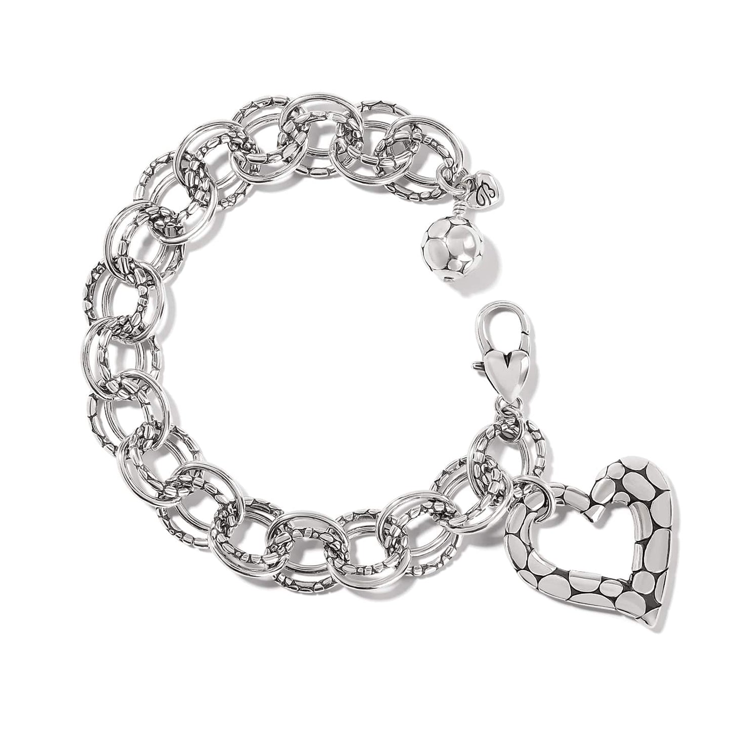 Brighton charm bracelet with silver-plated linked rings, dotted heart charm, and beaded ball accent on a white background