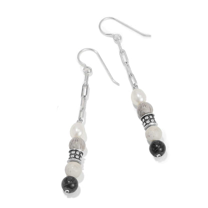 Brighton drop earrings with pearl, grey, cream, and black beads on silver-plated chains on a white background