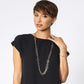 Model wearing a Brighton long silver-plated chain link necklace with coordinating Brighton ring and bracelet accessories