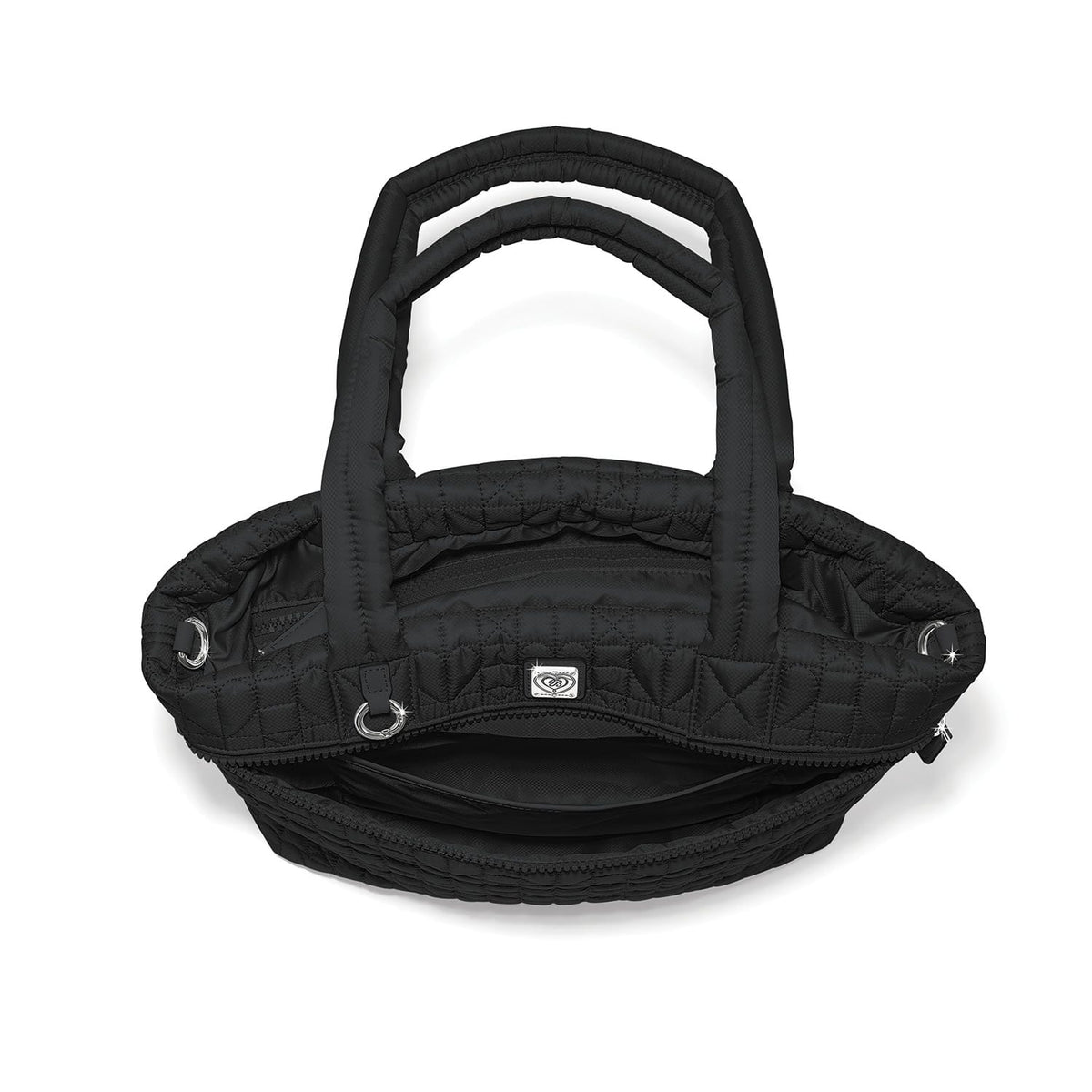 Brighton quilted handbag shown from above with dual padded handles and silver-tone hardware on a white background