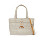Brighton quilted handbag in cream with heart pattern, J heart A monogram, and tan crossbody strap on a white background