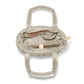 Brighton quilted handbag interior view showing beige lining with zip pocket and leather trim on a white background