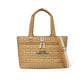 Brighton tote handbag in tan quilted heart pattern with Good Vibes Only text and striped crossbody strap on a white background
