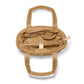 Brighton tan quilted handbag interior view showing zip pocket, slip pockets, and padded handles on a white background