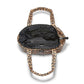 Brighton leopard print handbag shown open with black interior lining and zippered pocket on a white background