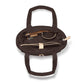 Brighton brown quilted handbag interior view showing zip pocket and tan leather trim on a white background