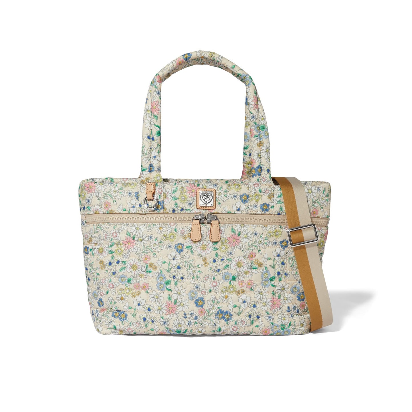 Brighton tote handbag with pastel floral print, dual handles, zip pocket, and adjustable tan crossbody strap on a white background