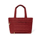 Brighton tote handbag in red quilted fabric with dual top handles and front pocket on a white background