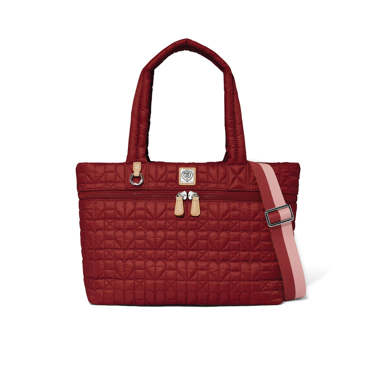 Brighton red quilted handbag with heart pattern, dual top handles, and pink striped crossbody strap on a white background