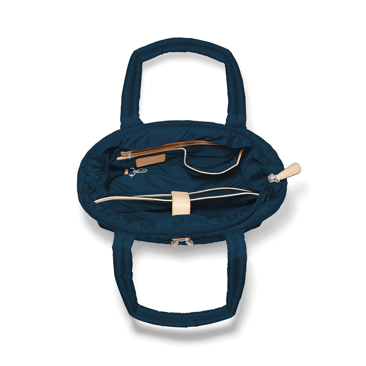Brighton navy blue handbag interior view showing zippered pocket, leather trim accents, and fabric lining on a white background