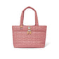 Brighton tote handbag in pink quilted heart pattern with tan leather zipper pulls and logo charm on a white background