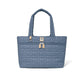 Brighton tote handbag in blue quilted heart pattern with dual handles and front zip pocket on a white background