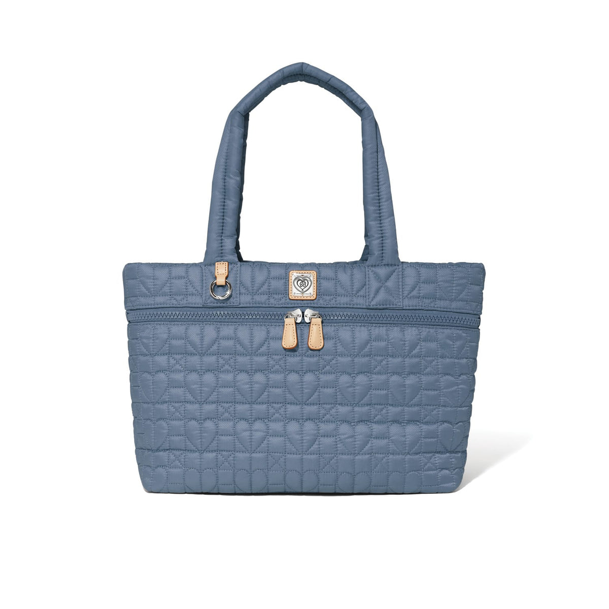 Brighton tote handbag in blue quilted heart pattern with dual handles and front zip pocket on a white background