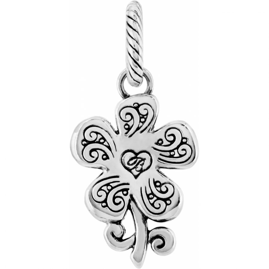 Brighton four-leaf clover charm with silver-plated scroll detailing and heart center on a white background