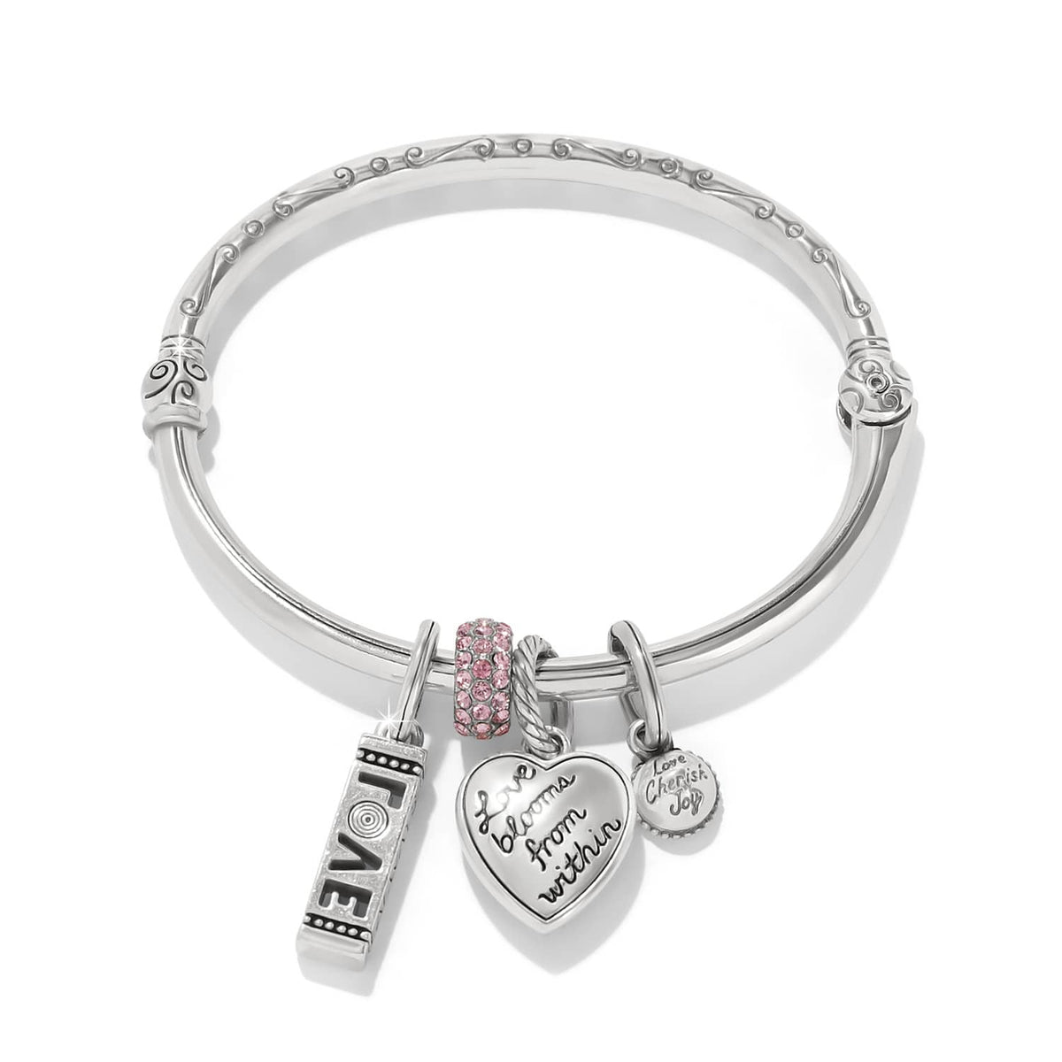 Brighton silver-plated bangle bracelet with pink crystal bead and engraved heart love charms on a white background
