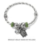 Brighton turtle charm with textured shell and crystal accent, shown with silver-plated bangle and beads on white background