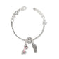 Brighton silver-plated charm bracelet with crystal hearts, sunglasses charm with pink enamel, and sandal charm on a white background