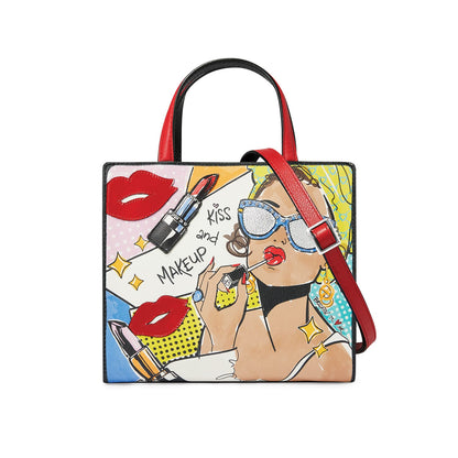 Brighton handbag with pop-art print featuring woman applying lipstick, red lips graphics, and red leather handles on a white background