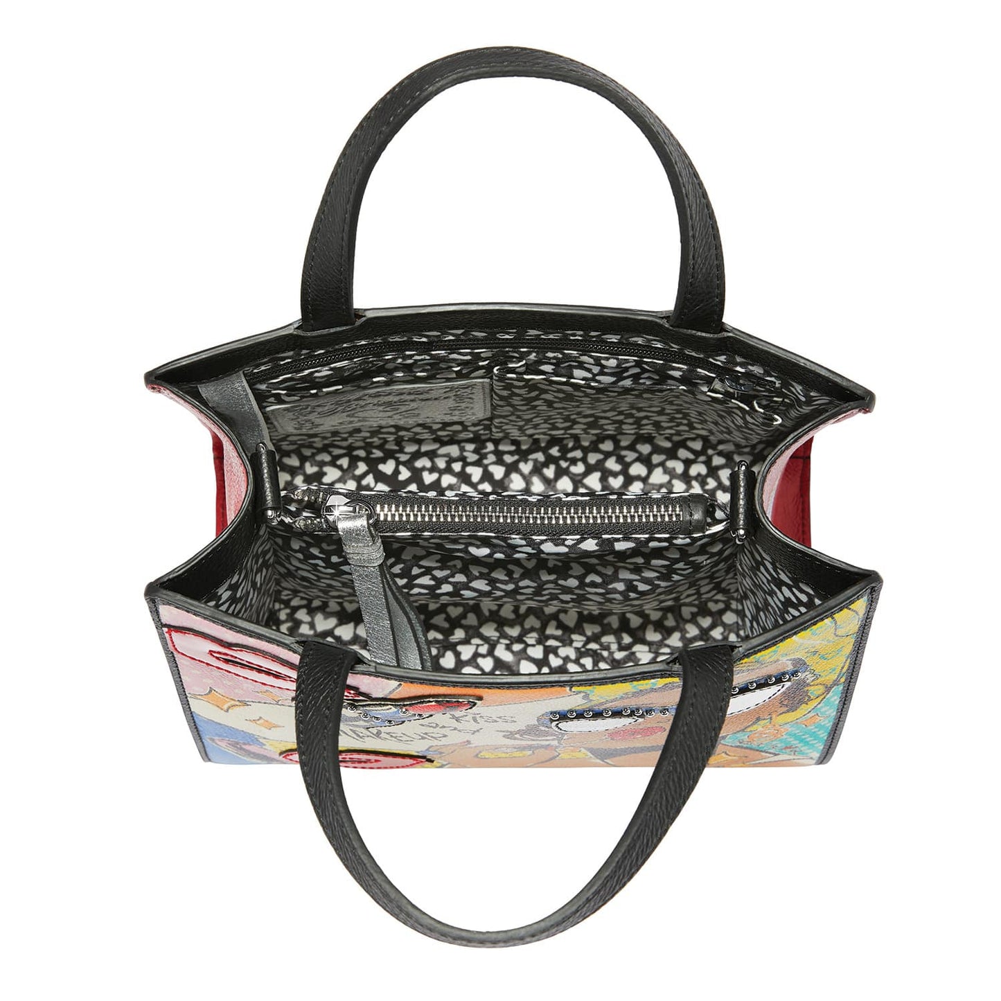 Brighton handbag interior view with heart-print lining, zippered pocket, and black leather handles on a white background