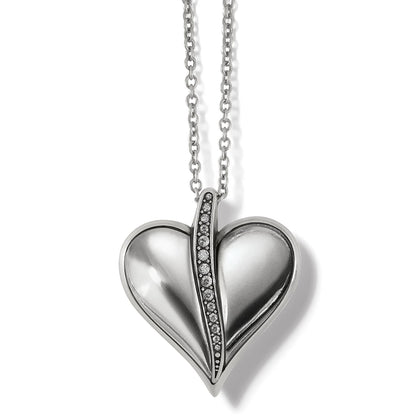 Brighton pendant necklace with silver-plated heart and central row of crystals on a white background