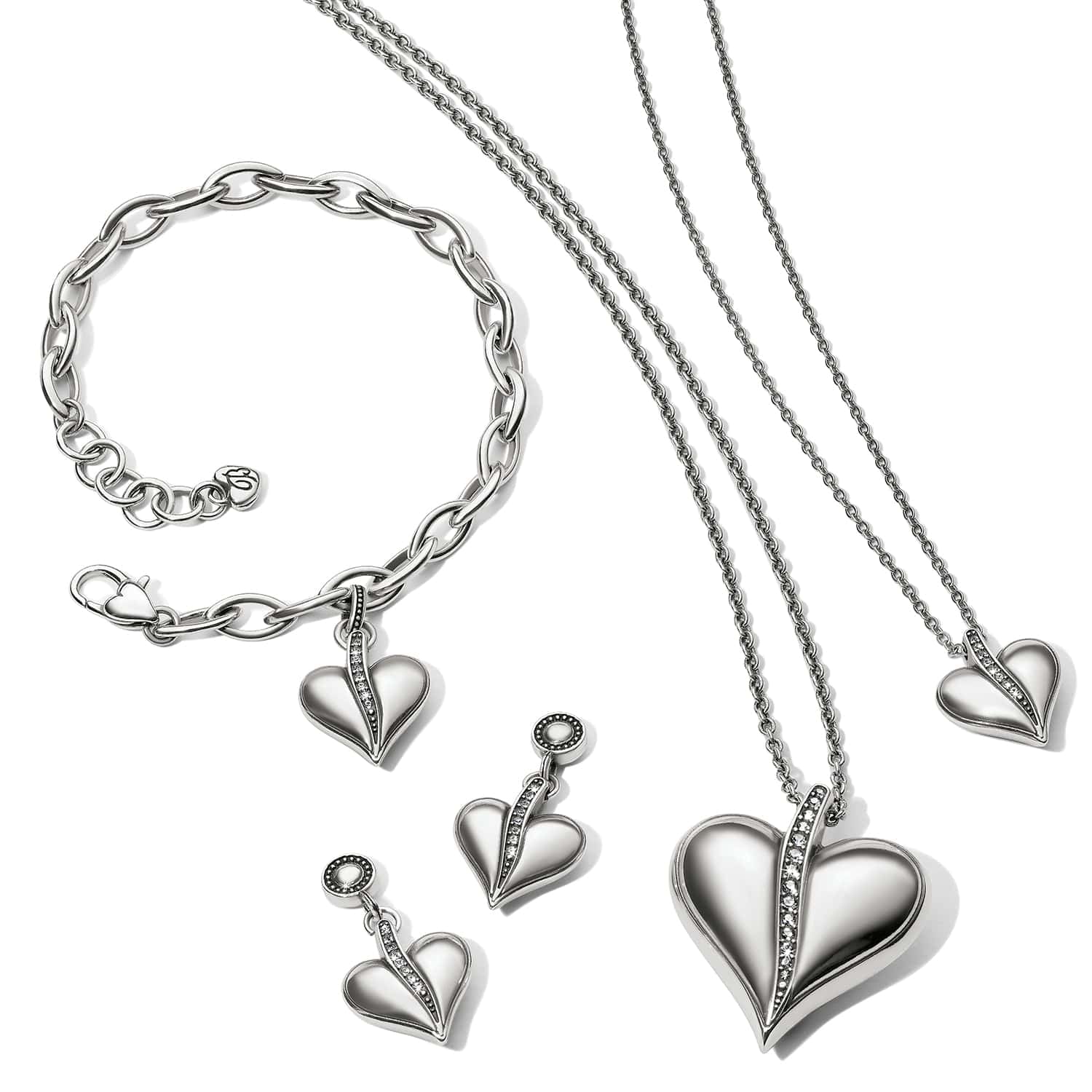Brighton silver-plated heart jewelry set styled with matching bracelet, earrings, and two necklaces with crystal accents
