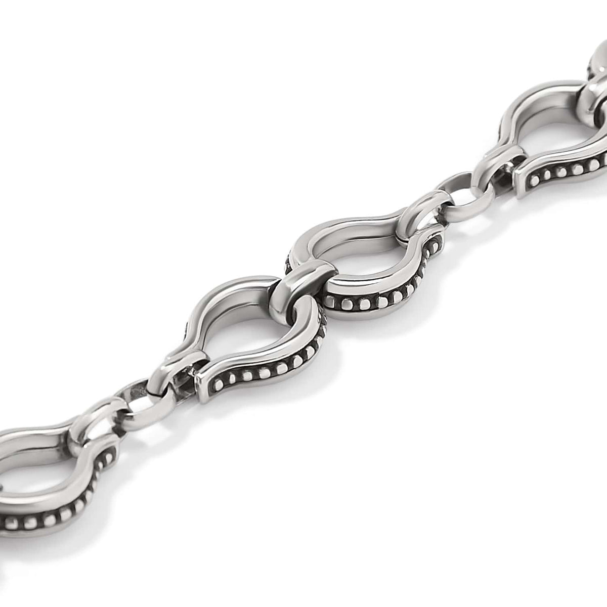 Close-up of Brighton chain with silver-plated horseshoe-shaped links featuring beaded edge detailing and polished finish