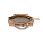 Brighton tan leather handbag shown open with patterned fabric interior, silver-tone studs, and rolled handle on a white background