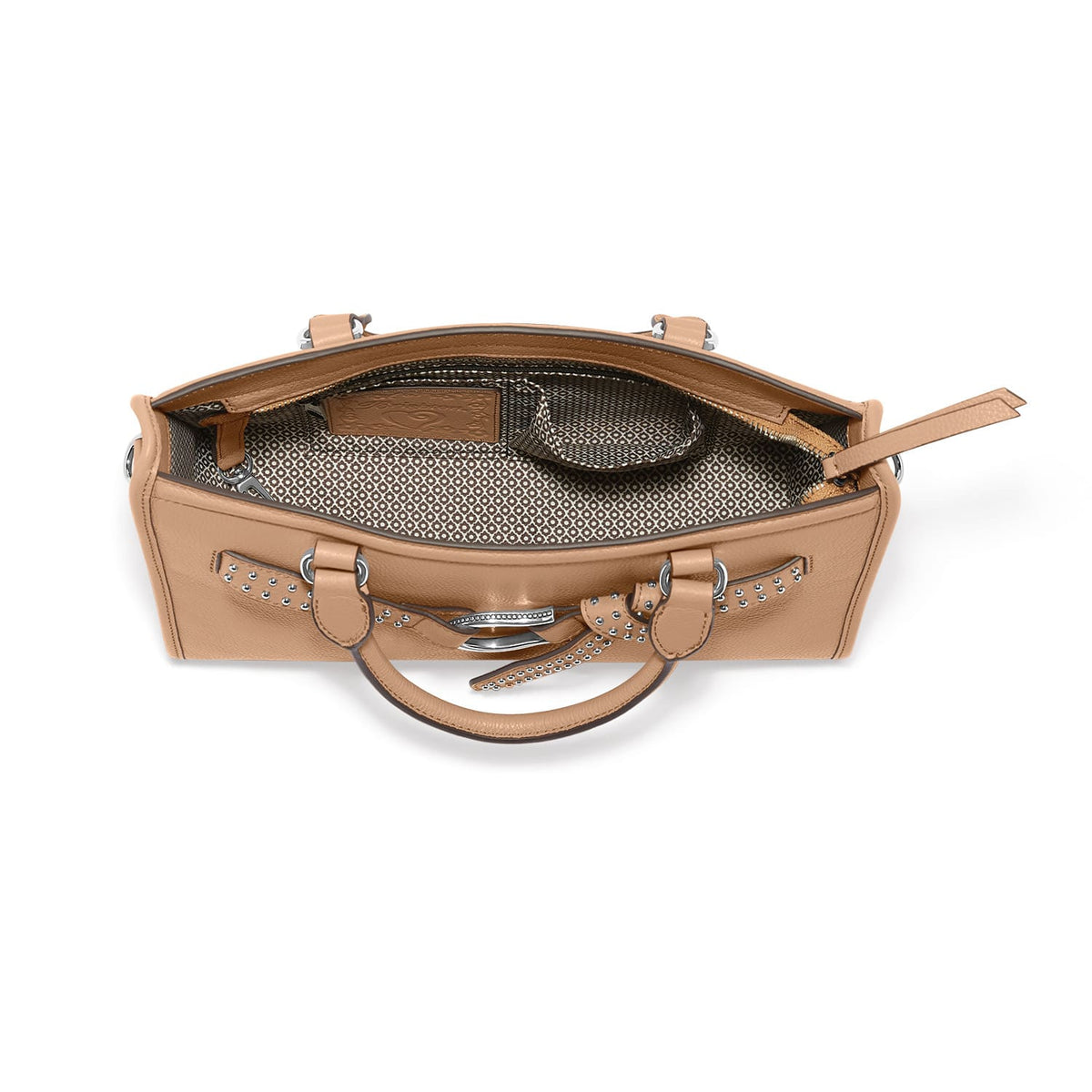 Brighton tan leather handbag shown open with patterned fabric interior lining and silver-tone hardware on a white background