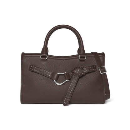 Brighton handbag in brown pebbled leather with studded belt detail, silver-tone hardware, and adjustable strap on a white background