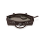 Brighton brown leather handbag shown open with patterned fabric interior lining and studded handle details on a white background