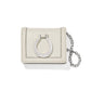 Brighton small wallet in cream pebbled leather with silver-tone ring detail and chain wristlet on a white background