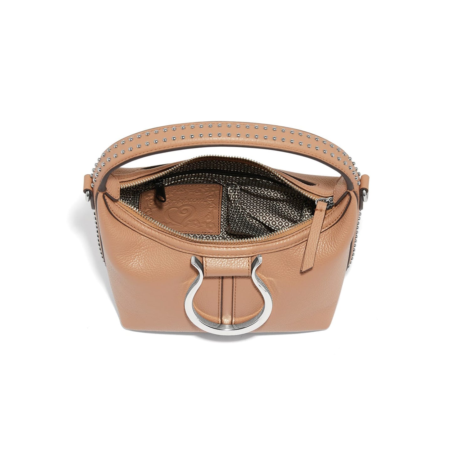 Brighton tan leather handbag shown open with studded top handle, patterned interior lining, and silver-tone ring hardware on a white background