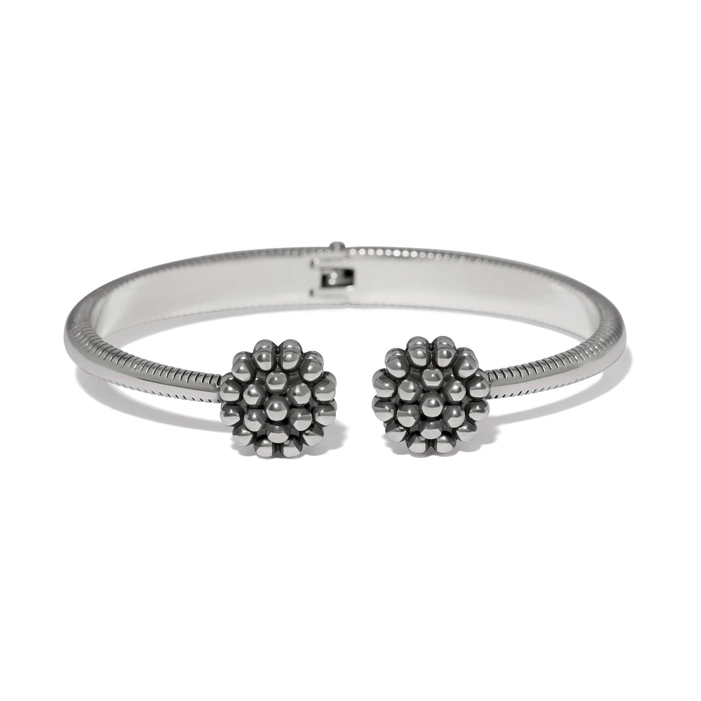 Brighton hinged cuff bracelet with silver-plated ribbed band and beaded flower cluster end caps on a white background