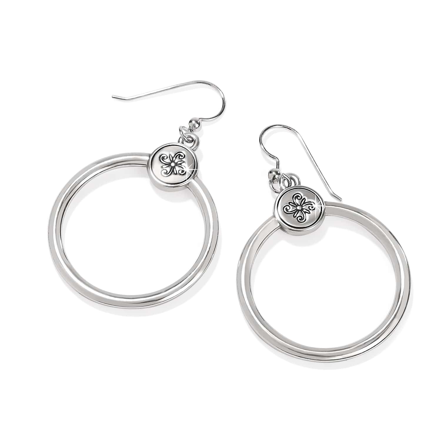 Brighton hoop drop earrings with silver-tone rings and engraved floral medallion accents on a white background