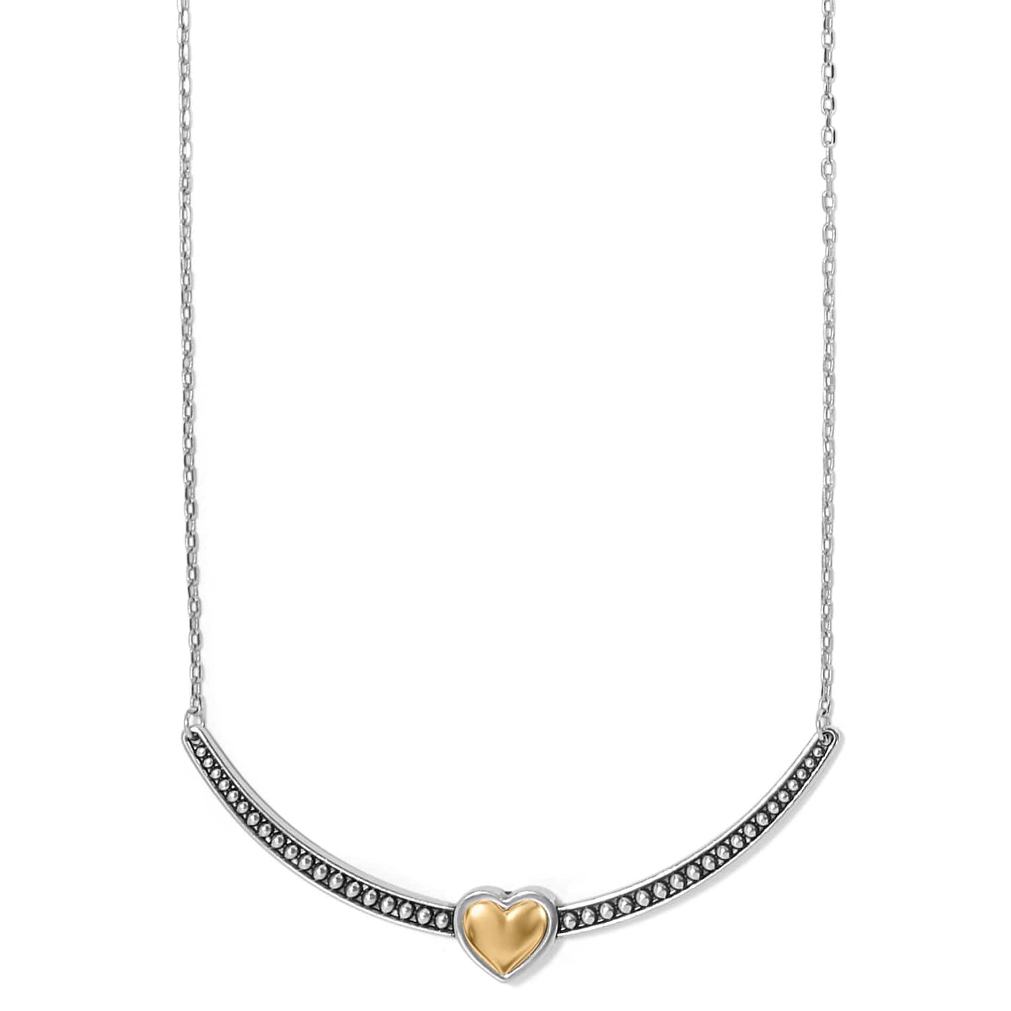 Brighton necklace with two-tone curved bar pendant featuring beaded silver-tone detail and gold-tone heart center on a white background