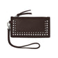 Brighton dark brown leather wristlet wallet with silver-tone studs, zip top, and detachable wrist strap on a white background