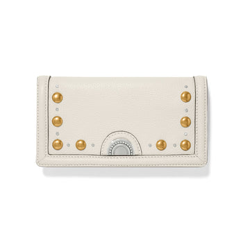 Brighton wallet in cream leather with gold-tone studs, crystal accents, and silver-tone medallion clasp on a white background