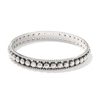 Brighton bangle bracelet with silver-plated beaded design and cutout interior detailing on a white background