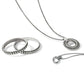 Brighton silver-plated pendant necklace styled with beaded bangle bracelets on a white background