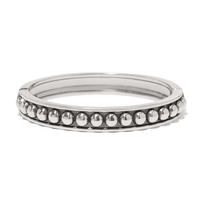 Brighton bangle bracelet with silver-plated beaded row detail and polished frame on a white background