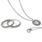Brighton silver-plated jewelry set styled with beaded bangles and circle pendant necklaces on a white background