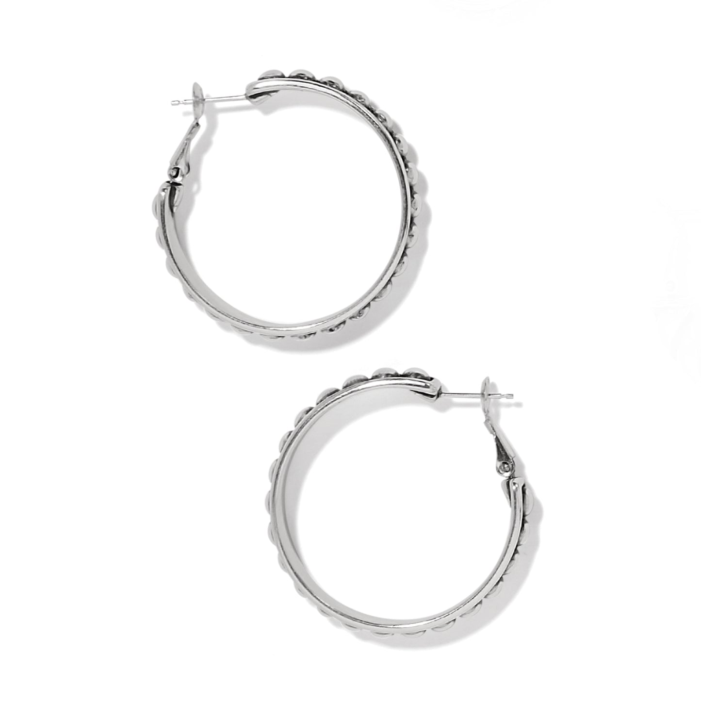 Brighton silver-plated hoop earrings with beaded outer edge detail and hinged posts on a white background