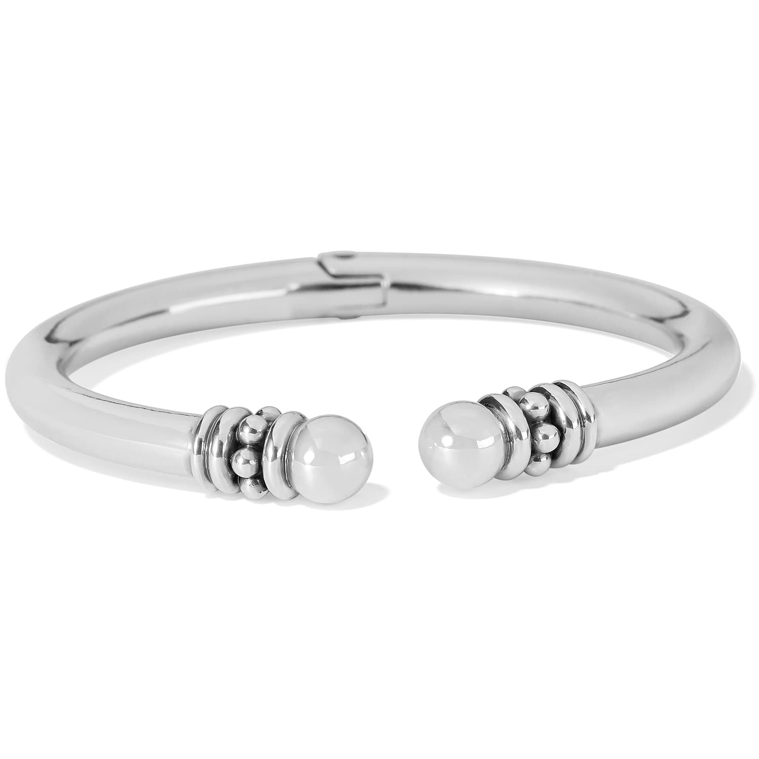 Brighton hinged cuff bracelet with silver-plated finish and beaded accents at open rounded tips on a white background