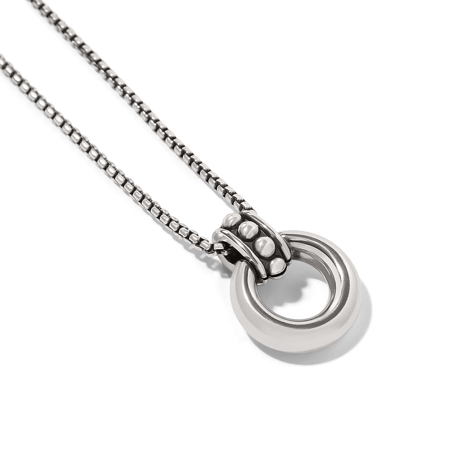 Brighton pendant necklace with silver-plated circular ring, beaded bail, and box chain on a white background