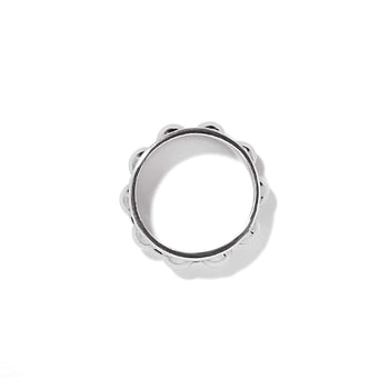 Brighton ring shown from the side with silver-plated scalloped bead edge detailing on a white background